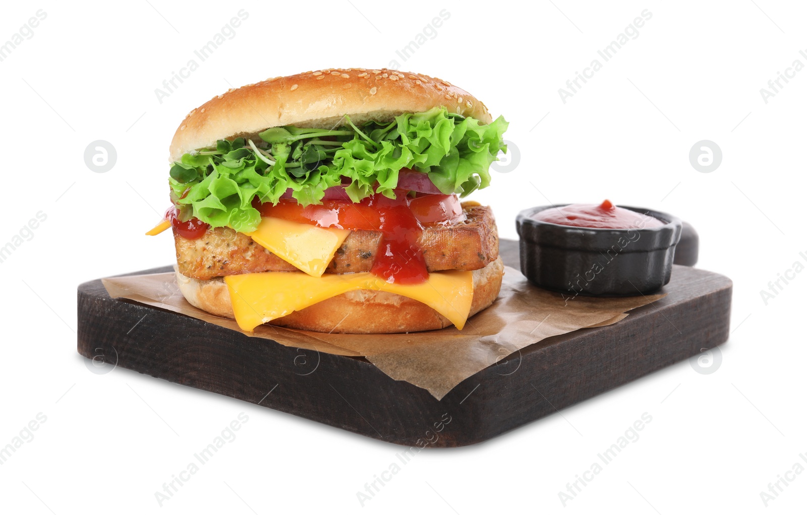 Photo of Delicious tofu burger served with sauce isolated on white