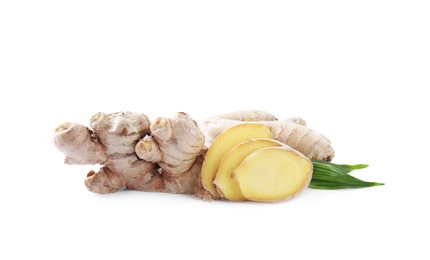 Whole and cut fresh ginger with leaves isolated on white