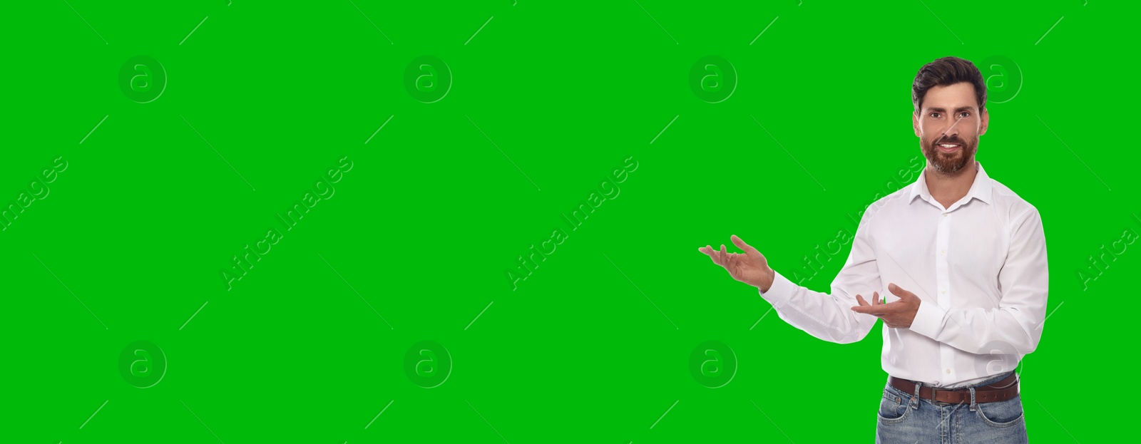 Image of Chroma key compositing. Broadcaster against green screen, banner design