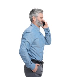 Photo of Mature businessman in stylish clothes talking on smartphone against white background