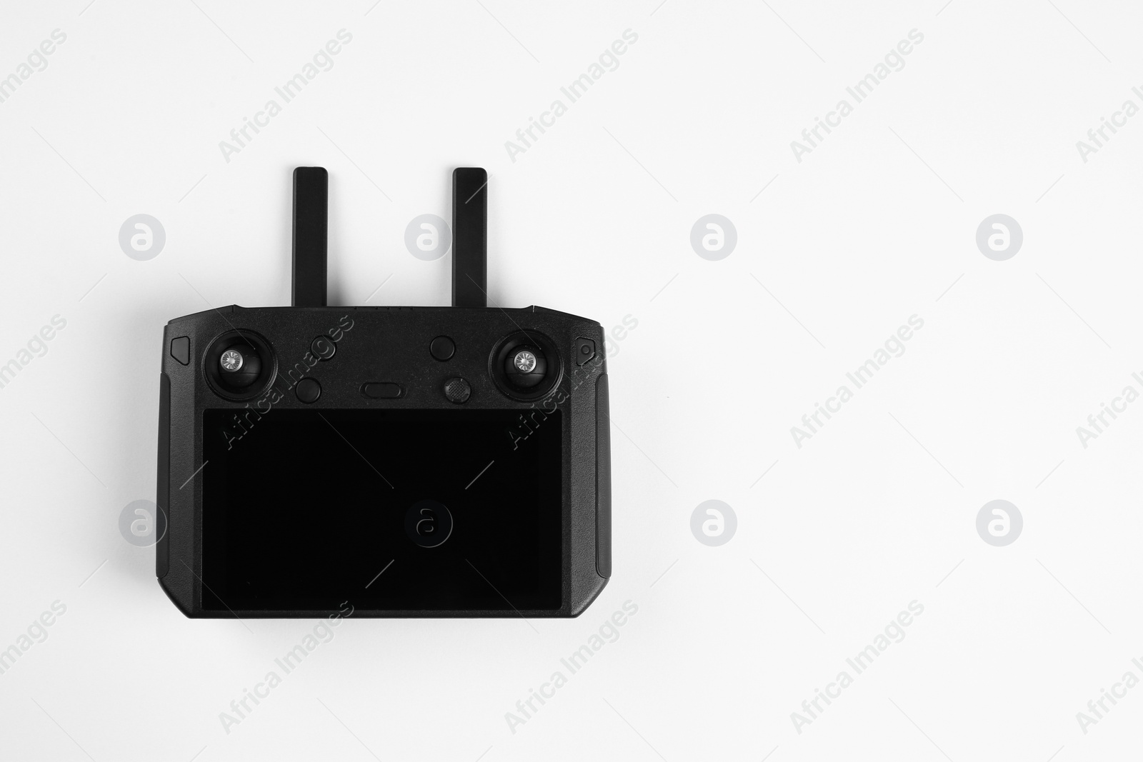 Photo of New modern drone controller isolated on white, top view