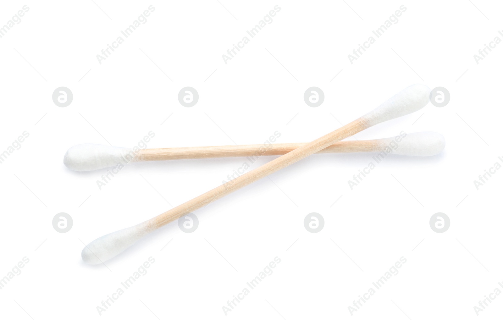Photo of Wooden cotton swabs on white background. Hygienic accessory