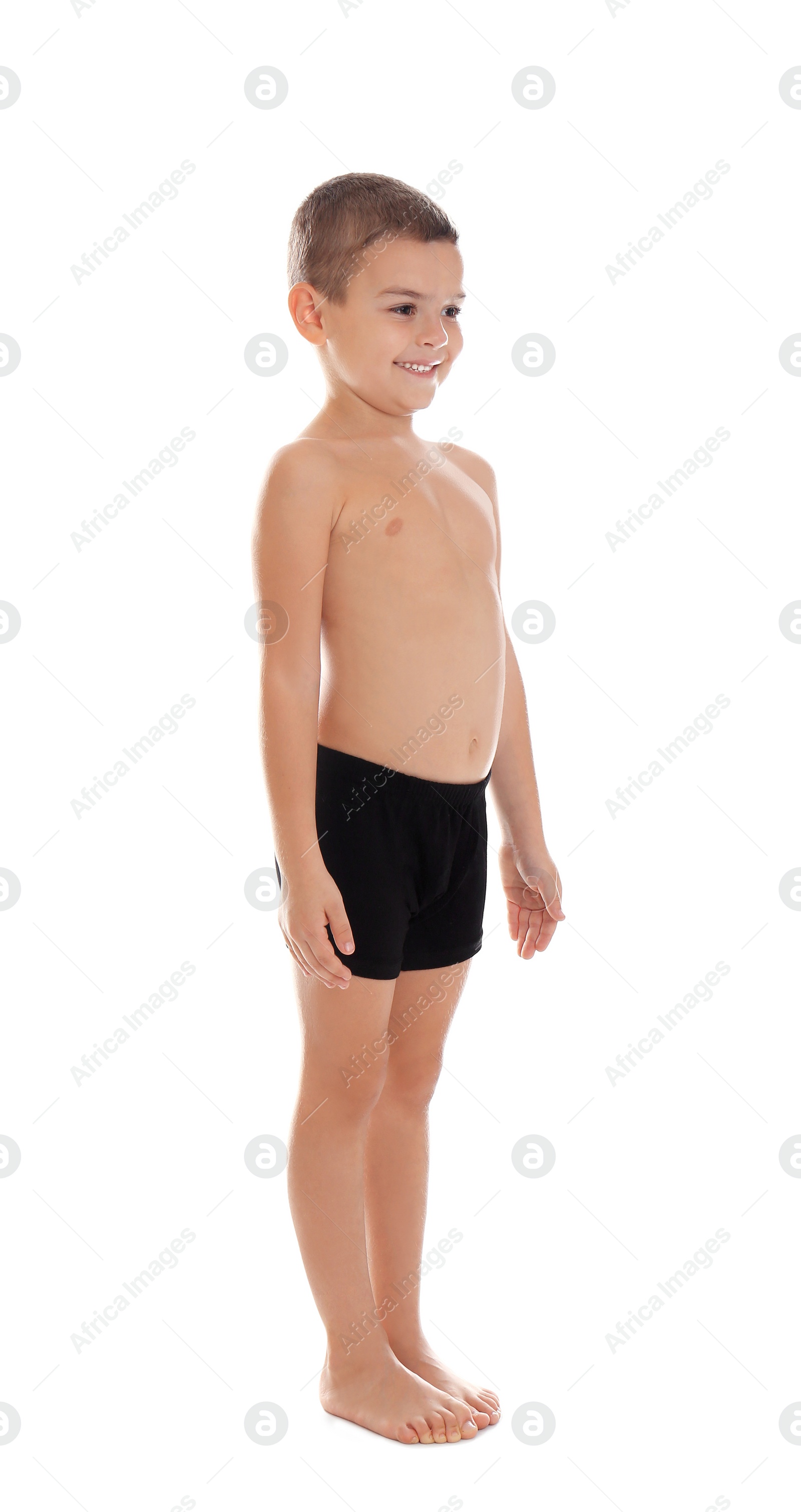 Photo of Cute little boy in underwear on white background