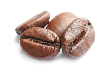 Photo of Fresh roasted coffee beans on white background