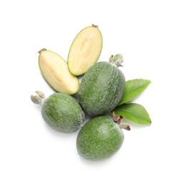 Photo of Cut and whole feijoas with leaves on white background, top view