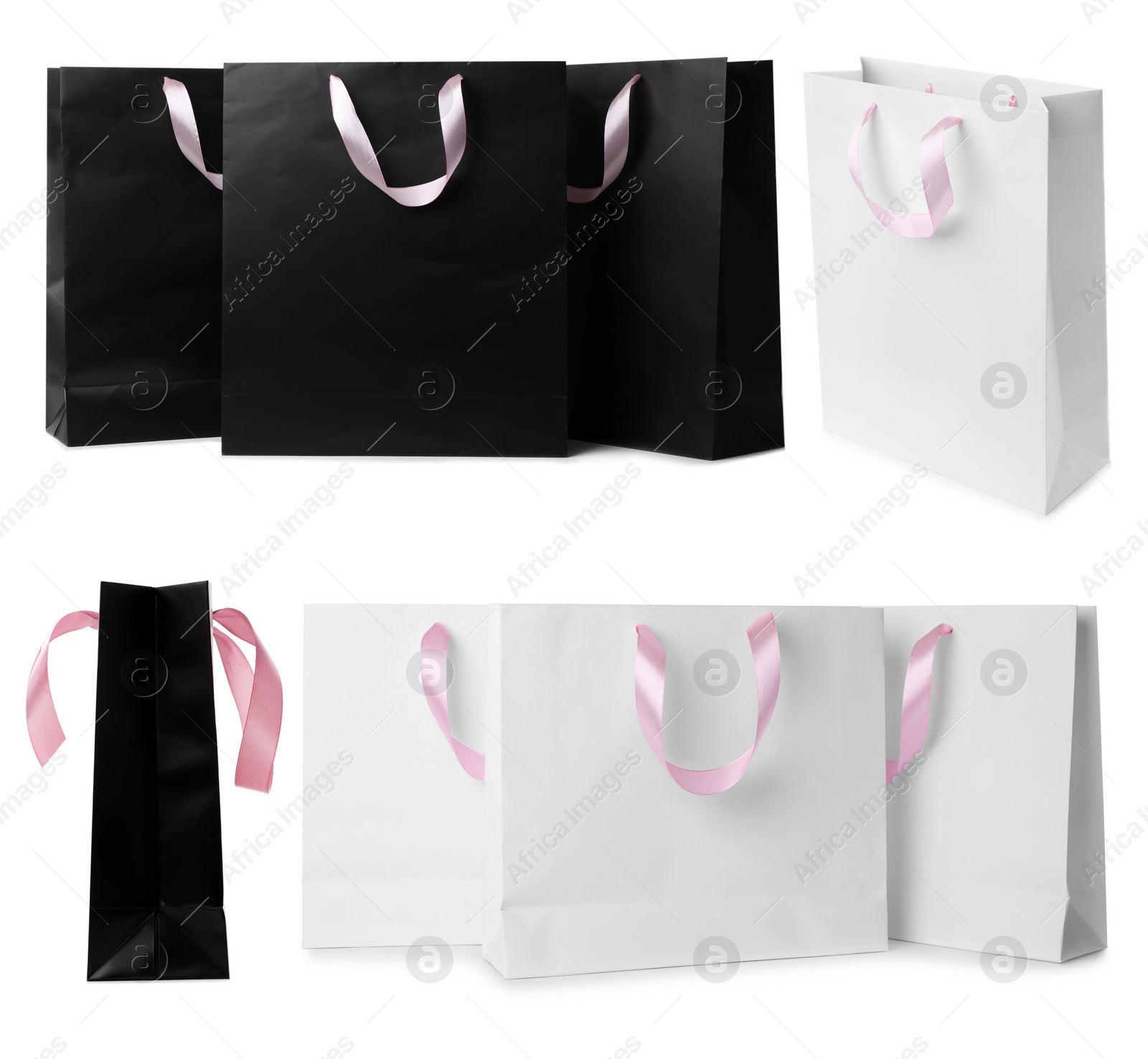 Image of Set with different paper shopping bags on white background