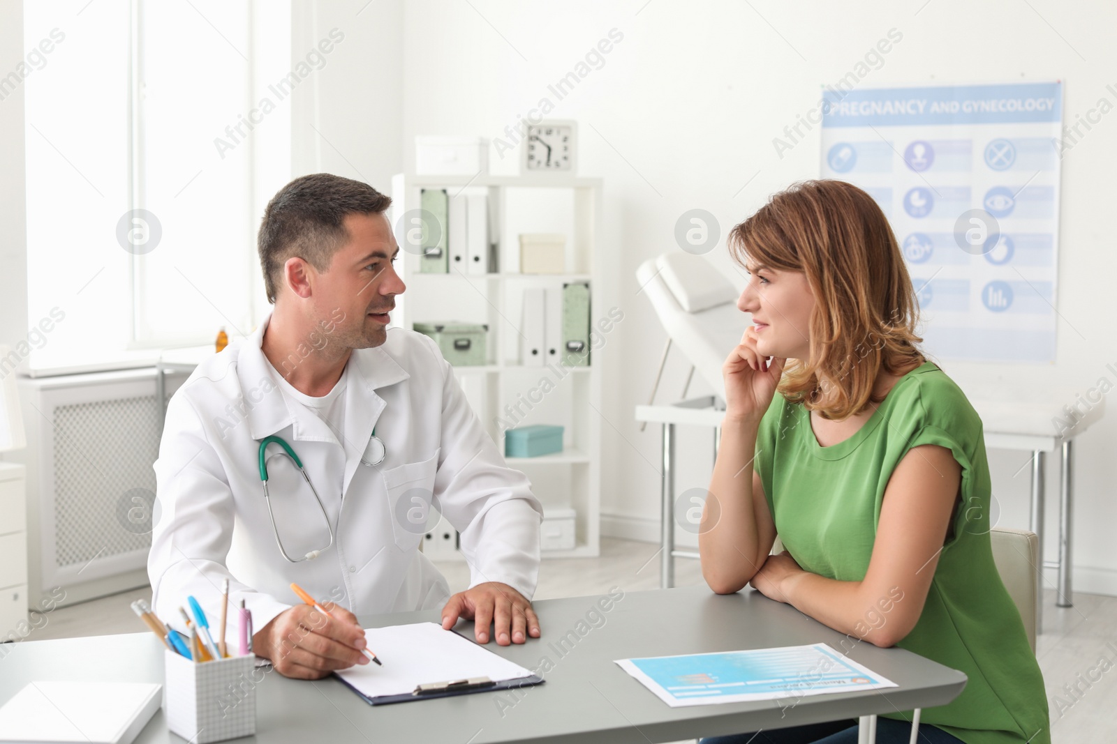 Photo of Patient having appointment with doctor in hospital