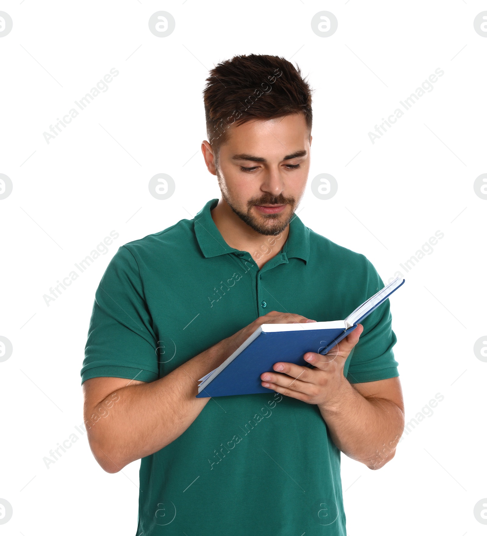 Photo of Handsome young man reading book on white background