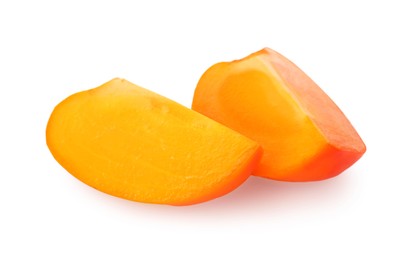 Photo of Pieces of delicious ripe juicy persimmons on white background