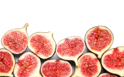 Photo of Cut ripe figs on white background, top view