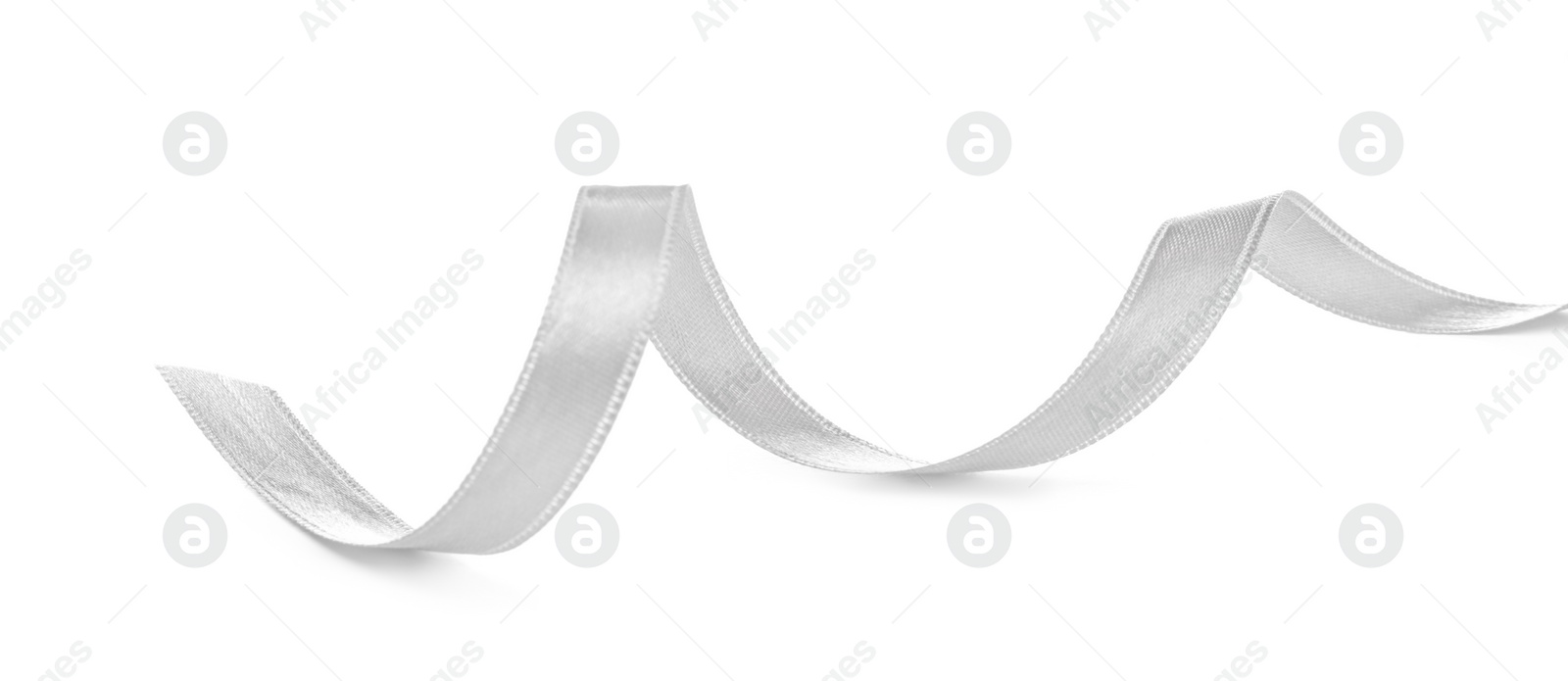 Image of One white satin ribbon isolated on white