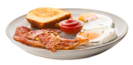 Photo of Plate with fried eggs, bacon, toasts and sauce on white background