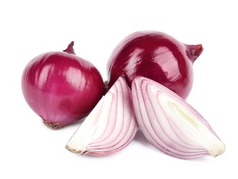 Fresh whole and cut red onions on white background