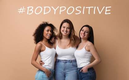 Image of Beautiful smiling women on beige background with hashtag Bodypositive