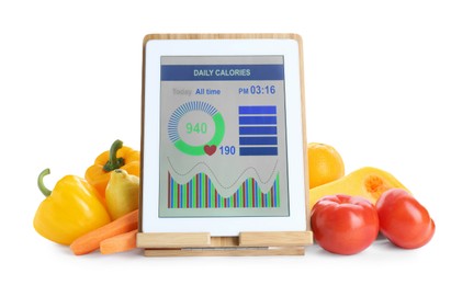 Photo of Tablet with weight loss calculator application and food products on white background