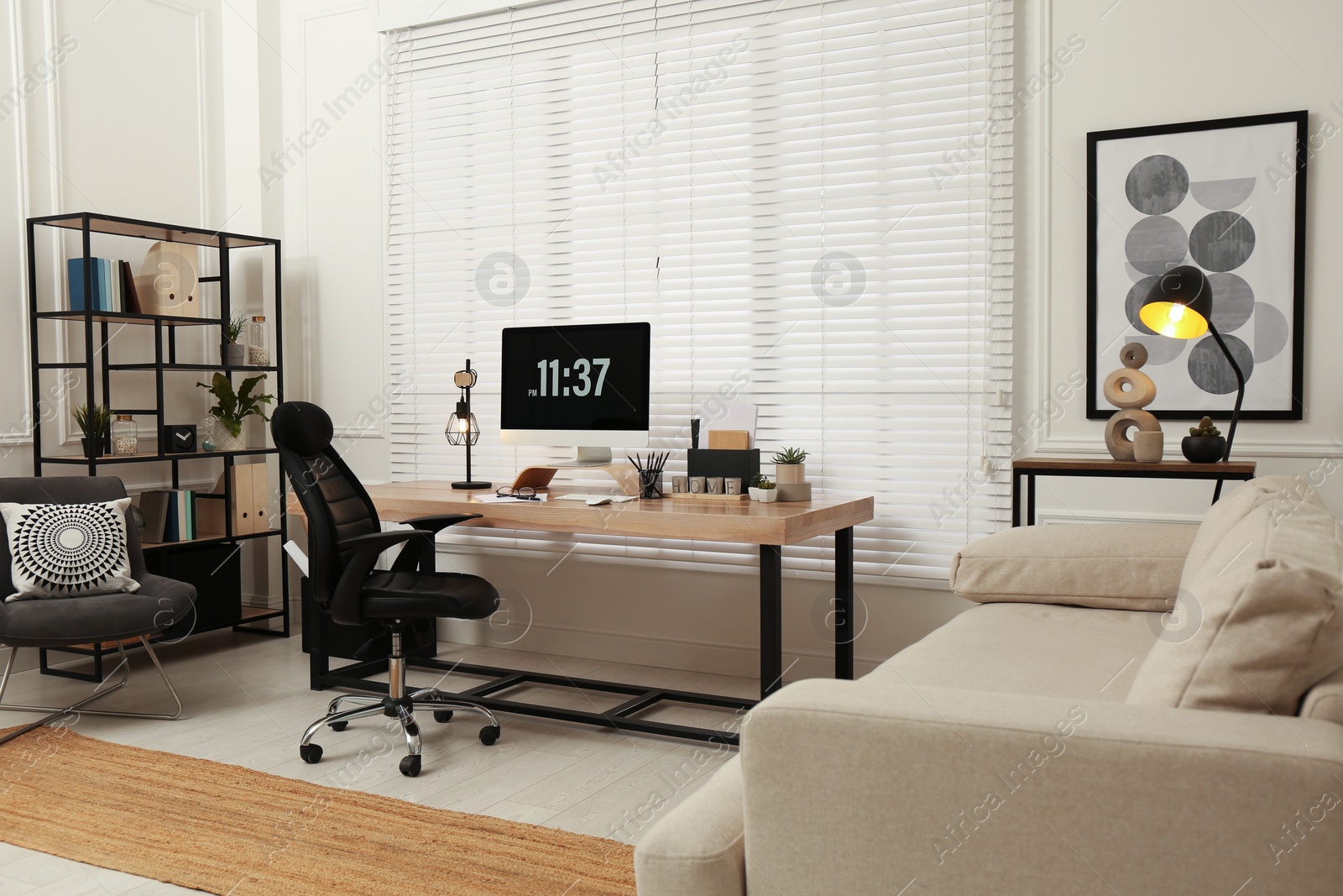 Photo of Home office interior with comfortable workplace near window