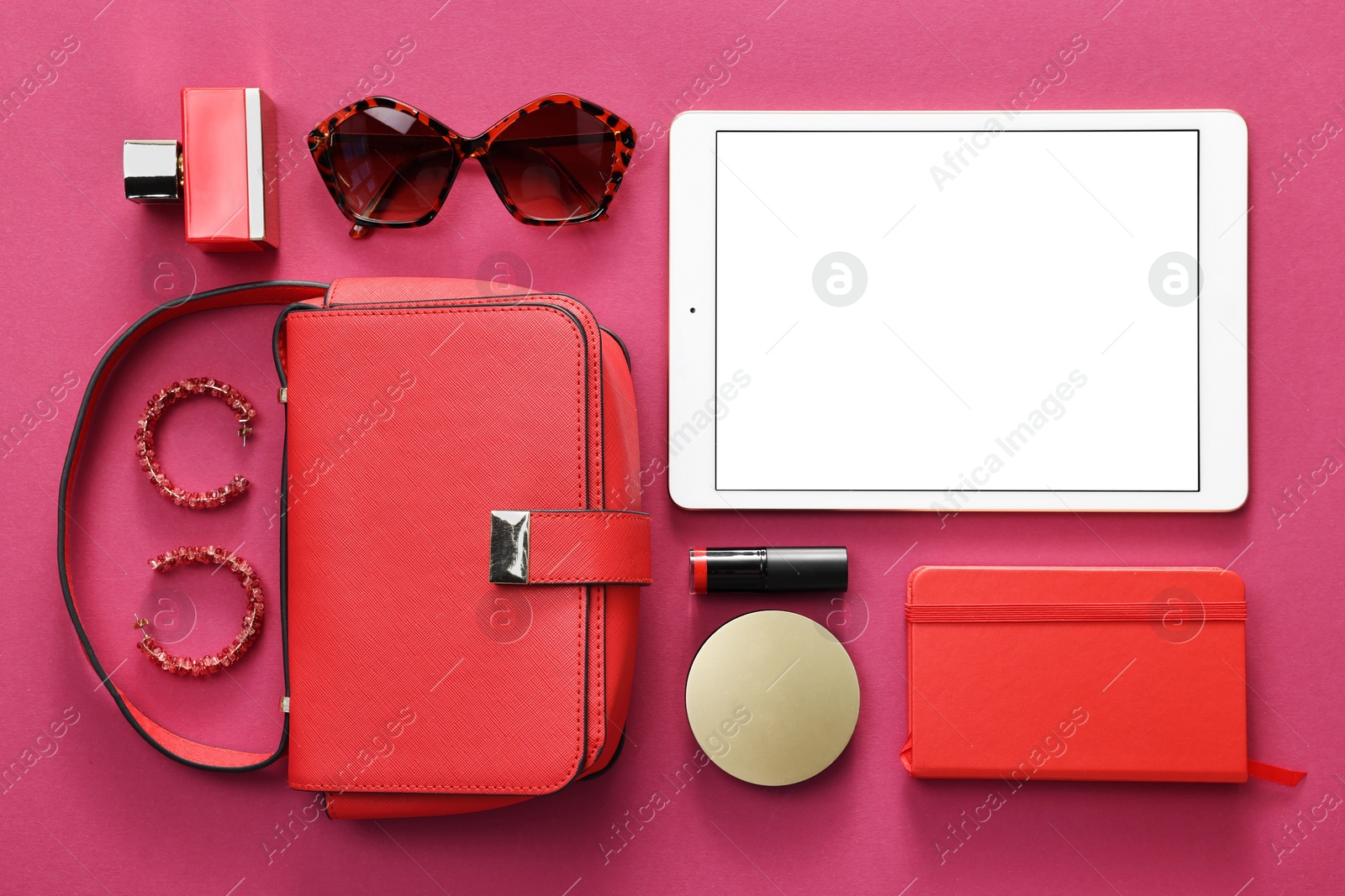 Photo of Flat lay composition with modern tablet on hot pink background. Space for text