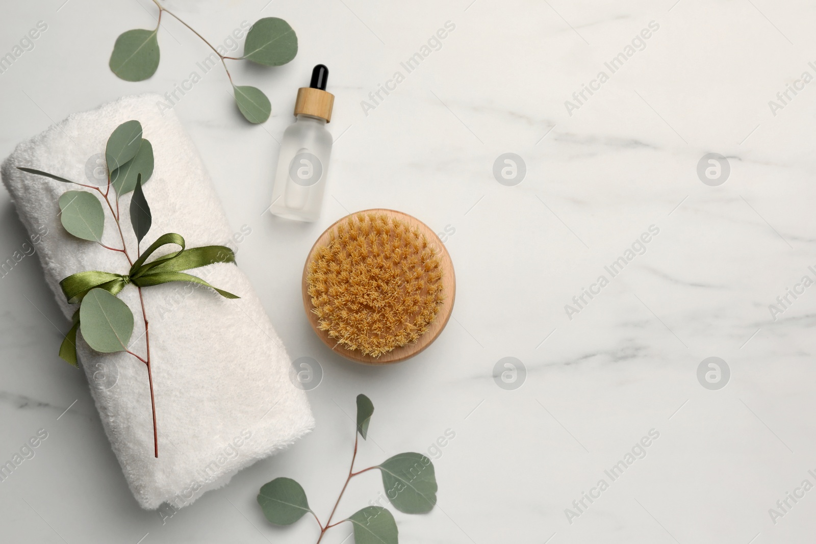 Photo of Flat lay composition with different spa products on white marble table. Space for text