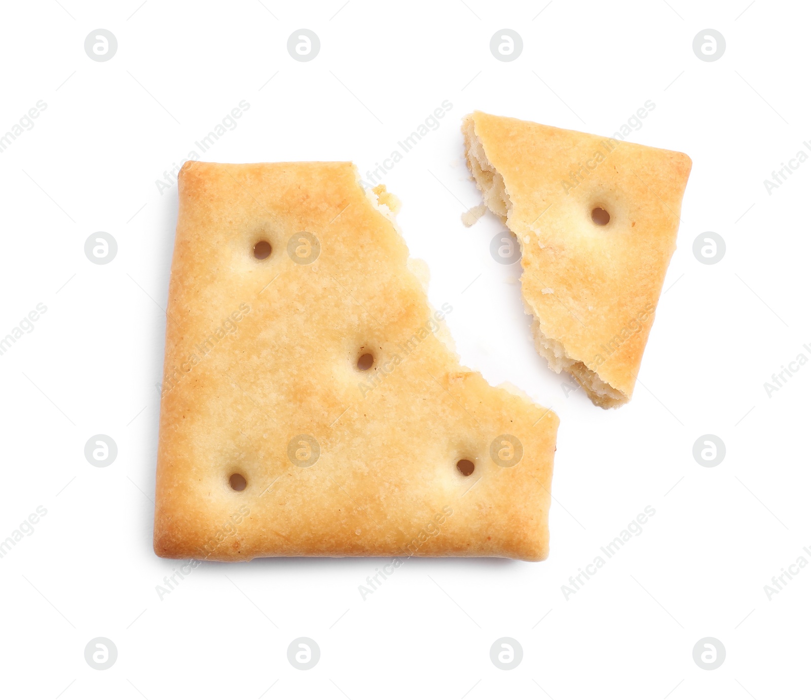 Photo of Crispy broken cracker isolated on white, top view