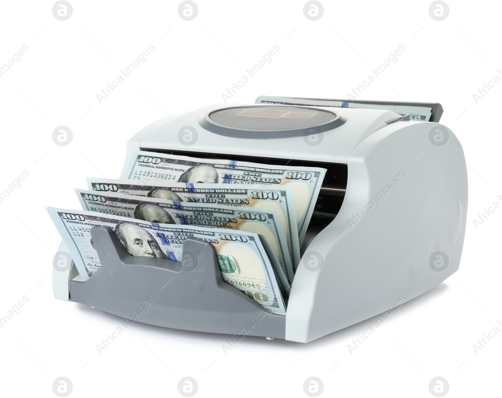 Photo of Modern electronic bill counter with money on white background