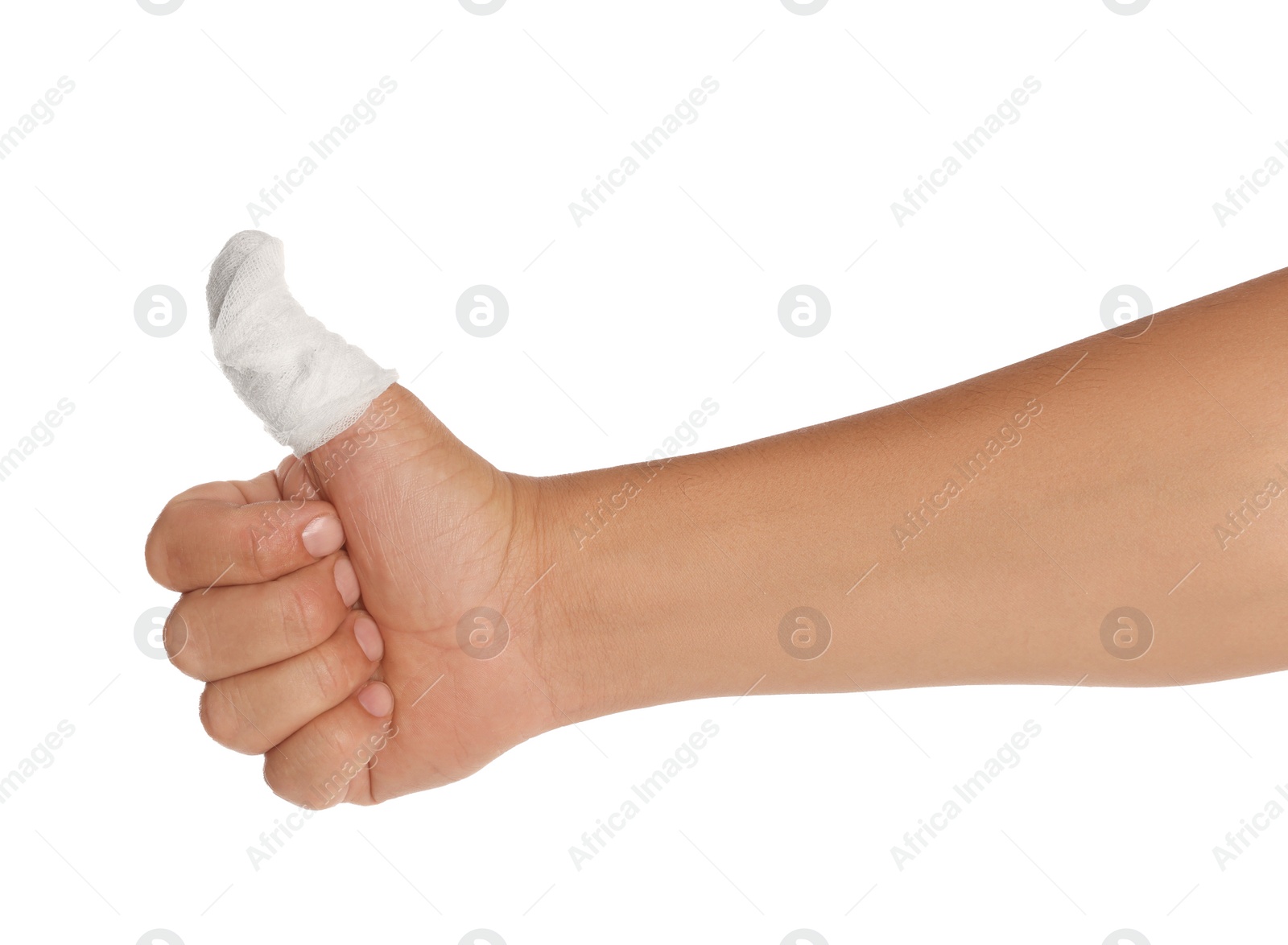 Photo of Man showing thumb up wrapped in medical bandage on white background, closeup