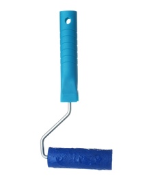 Photo of Roller brush with blue paint on white background