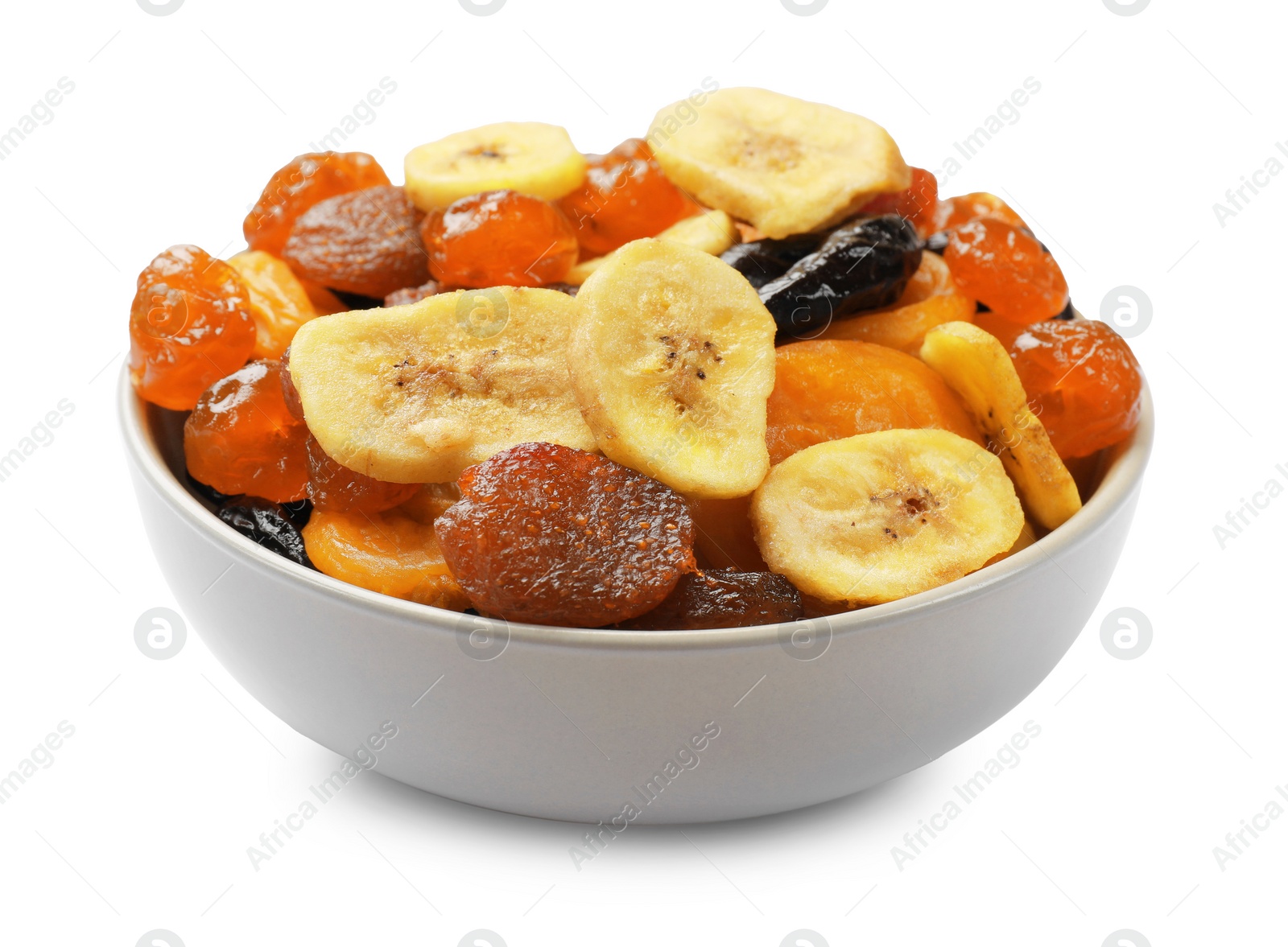 Photo of Mix of delicious dried fruits in bowl isolated on white