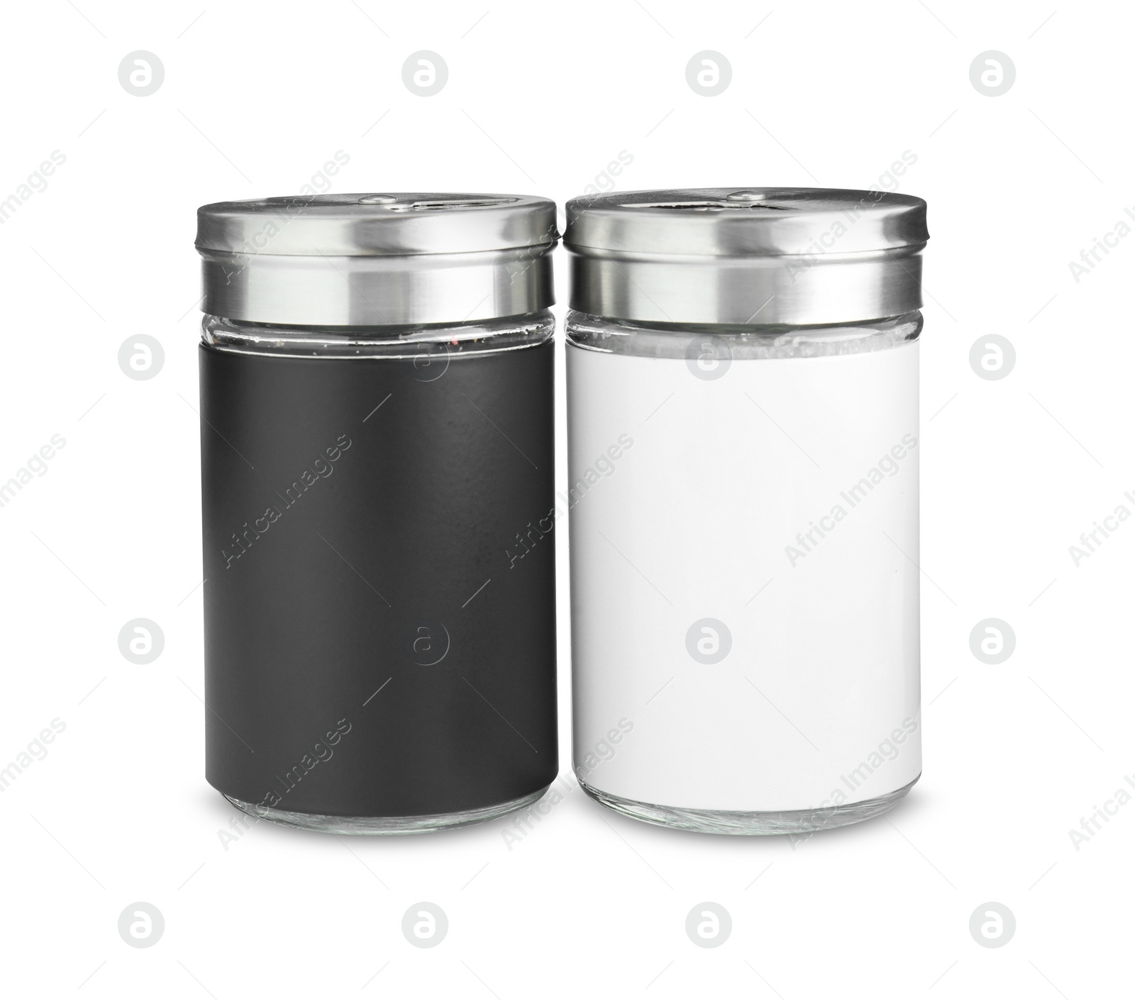 Photo of Salt and pepper shakers isolated on white