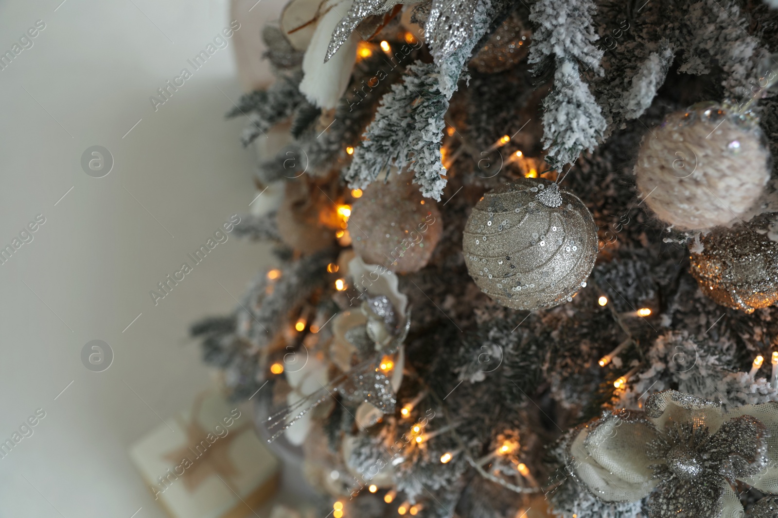 Photo of Beautiful Christmas tree, above view. Festive interior decoration