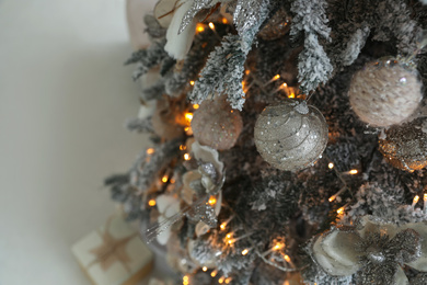 Photo of Beautiful Christmas tree, above view. Festive interior decoration