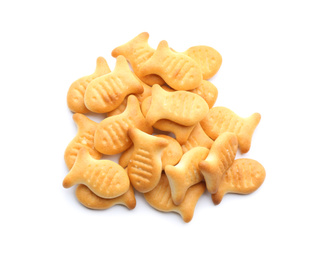 Photo of Delicious crispy goldfish crackers on white background