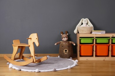 Child's room interior with rocking horse and different toys