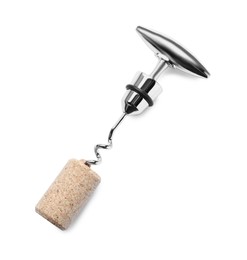 Photo of Corkscrew and wine bottle stopper isolated on white, top view