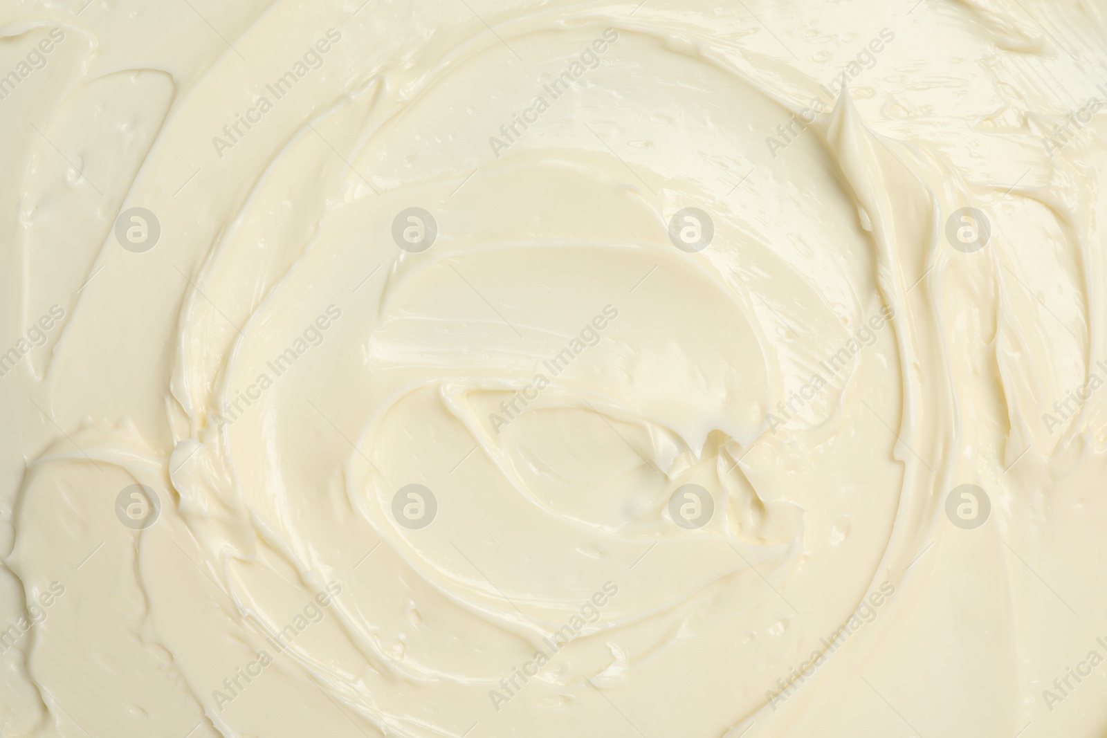 Photo of Texture of tasty butter as background, top view