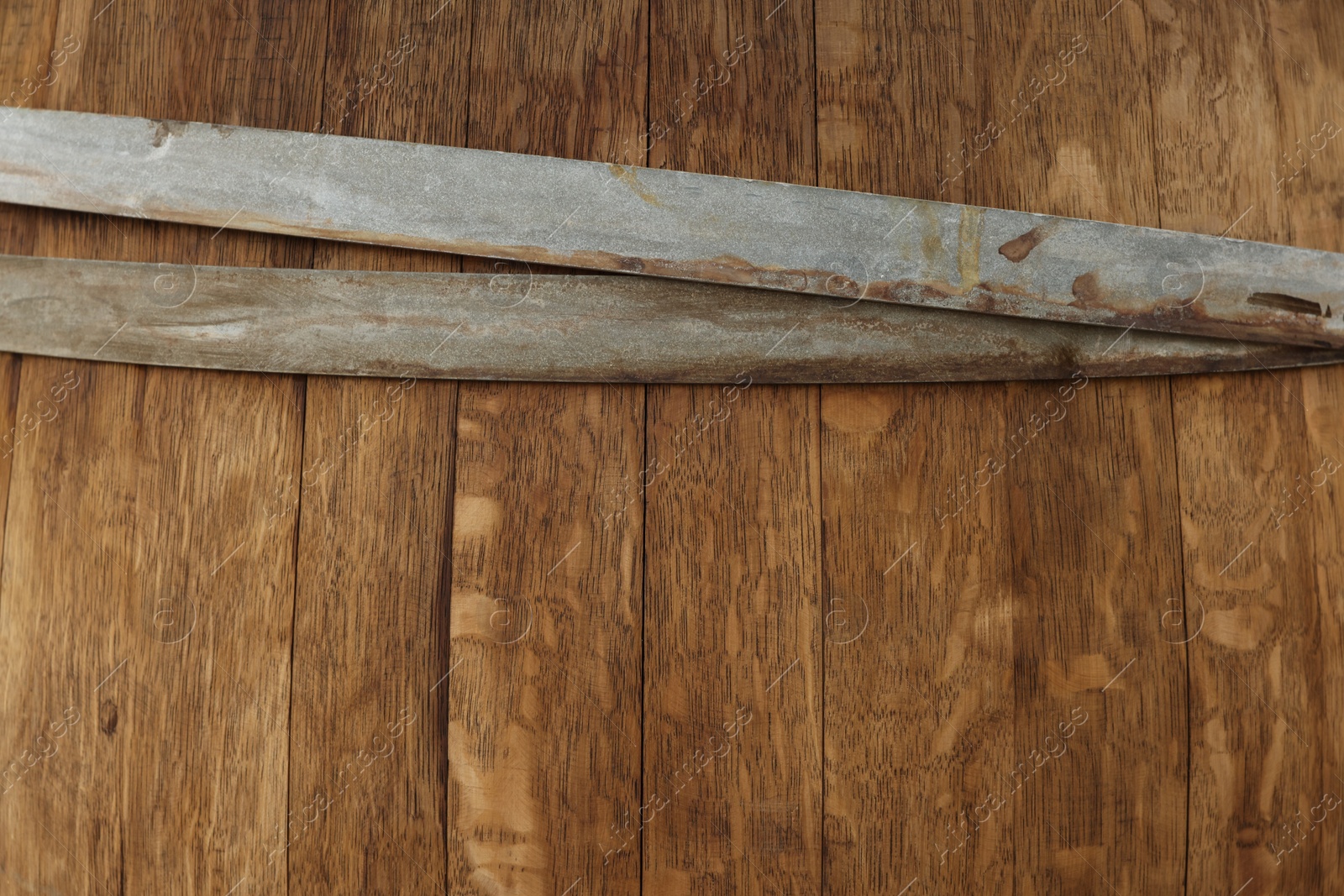 Photo of Traditional wooden barrel as background, closeup. Wine making