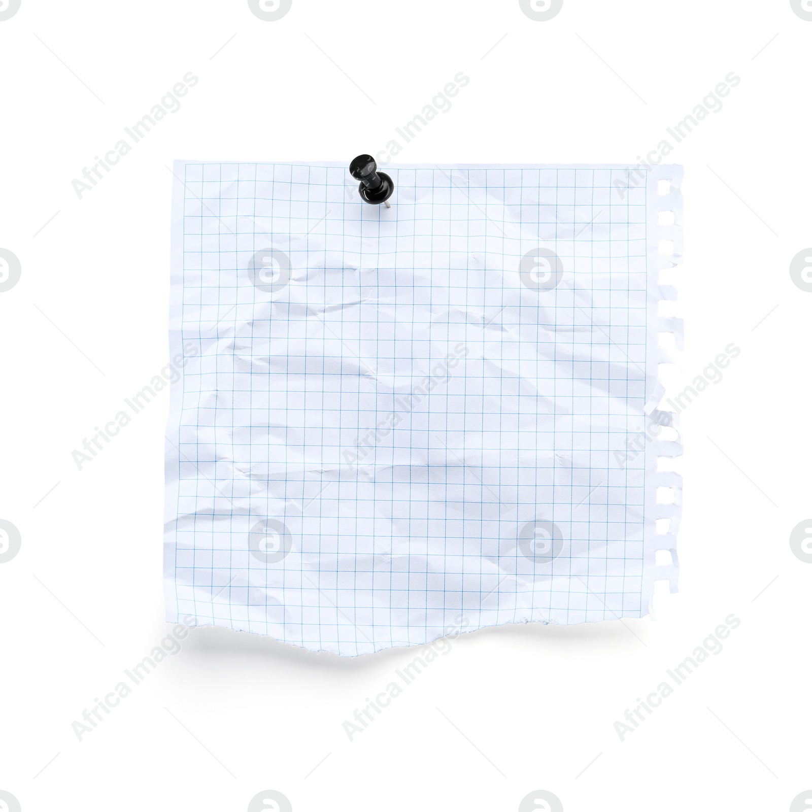 Photo of Piece of crumpled checkered notebook sheet with pin isolated on white