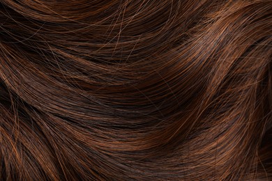 Photo of Beautiful brown hair as background, closeup view