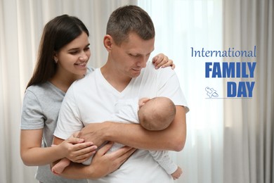 Image of Happy parents with their cute baby at home. Happy Family Day