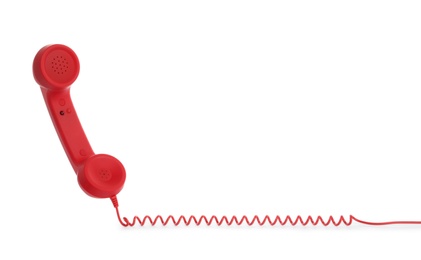 Photo of Red corded telephone handset on white background. Hotline concept