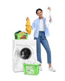 Photo of Beautiful woman with laundry near washing machine on white background
