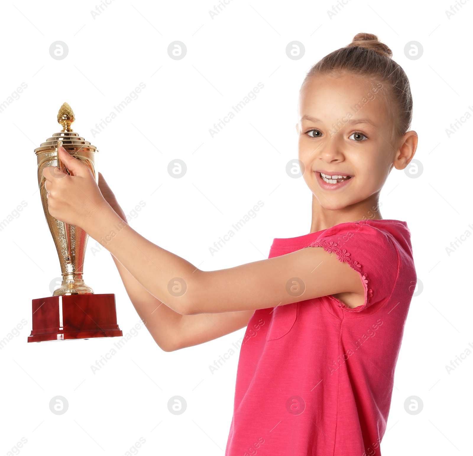 Photo of Happy girl with golden winning cup on white background