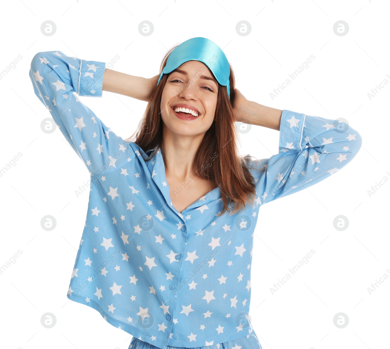 Photo of Beautiful woman wearing pajamas and sleep mask on white background. Bedtime