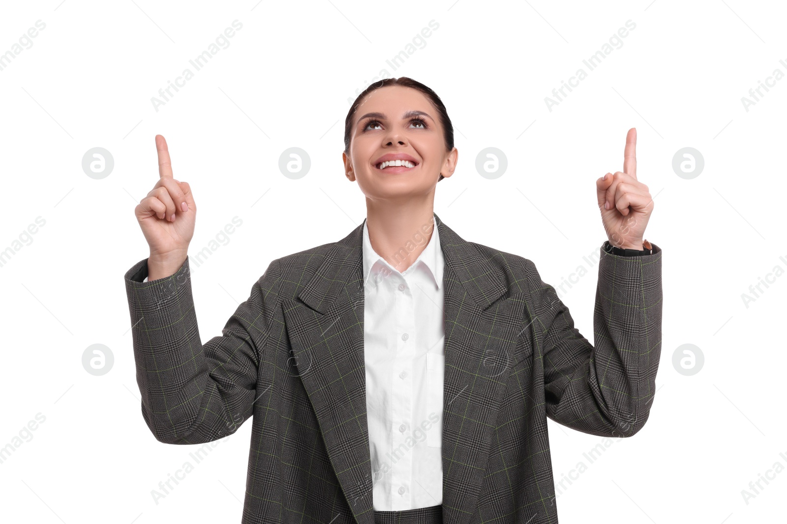 Photo of Beautiful businesswoman in suit pointing at something on white background