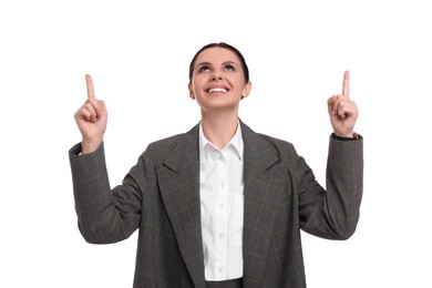 Photo of Beautiful businesswoman in suit pointing at something on white background