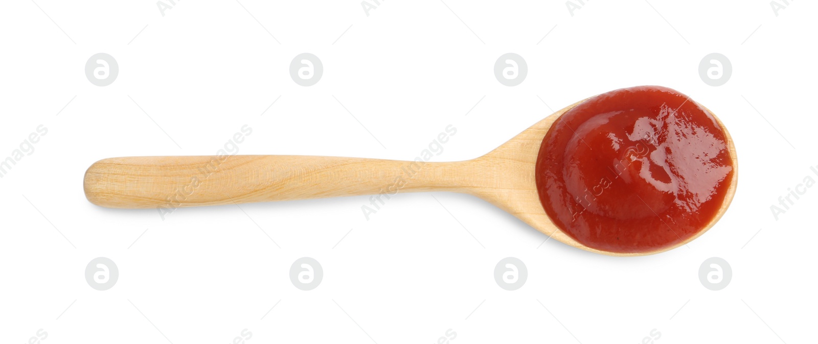 Photo of Tasty ketchup with spoon isolated on white, top view. Tomato sauce