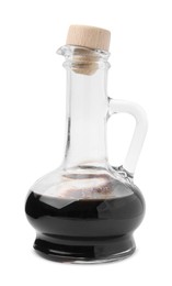 Organic balsamic vinegar in glass jug isolated on white