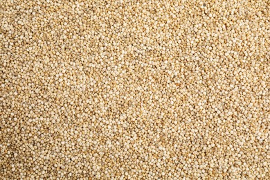 Photo of Heapwhite quinoa as background, top view. Veggie seeds