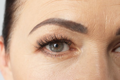 Beautiful older woman, closeup of eye