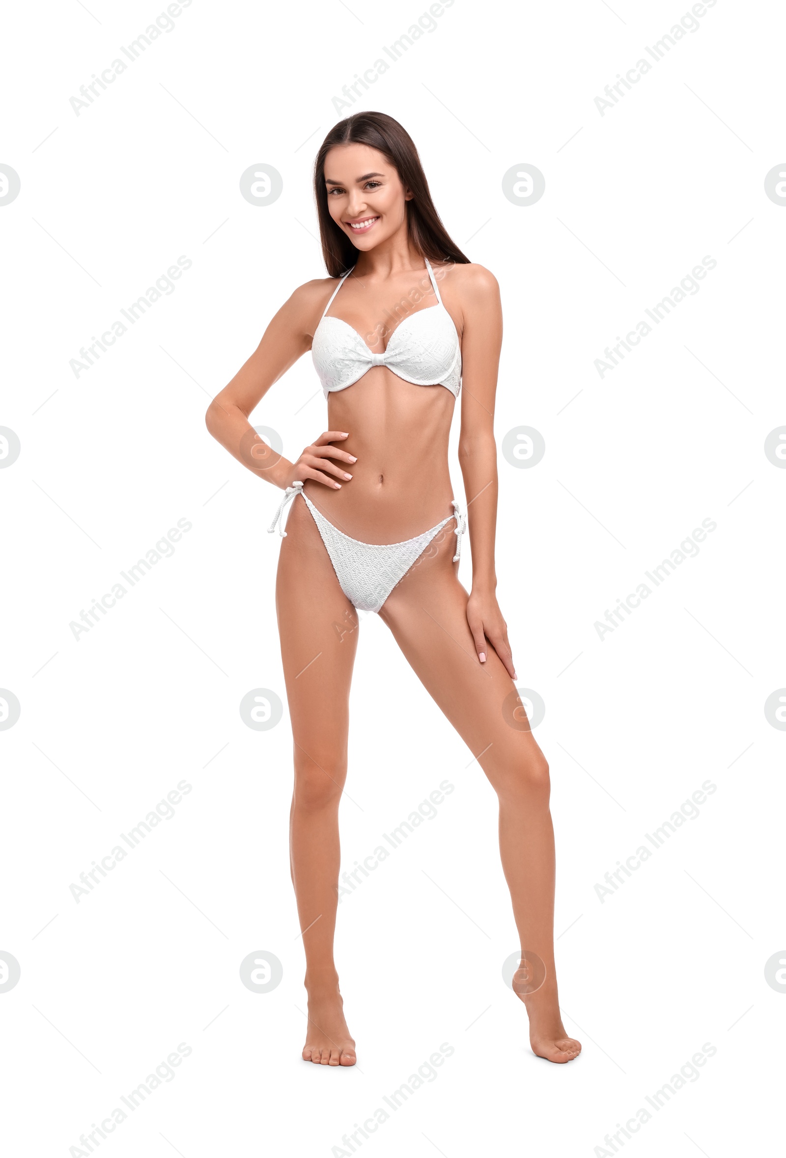Photo of Young woman in stylish bikini isolated on white