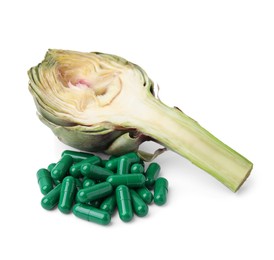 Photo of Fresh artichoke and pills isolated on white
